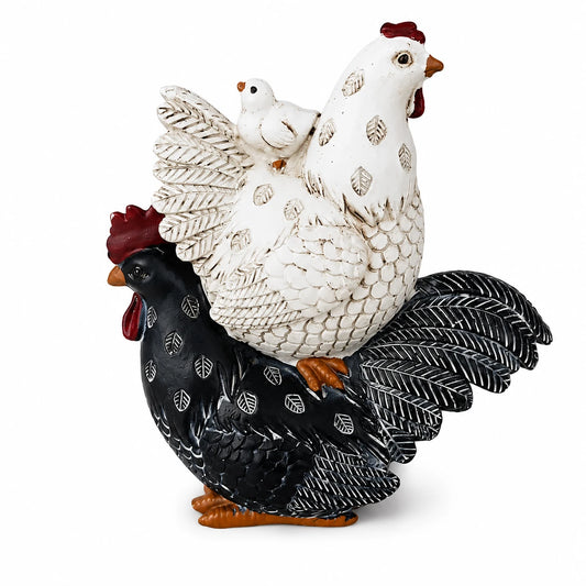 Figura de gallinas blanca y negra