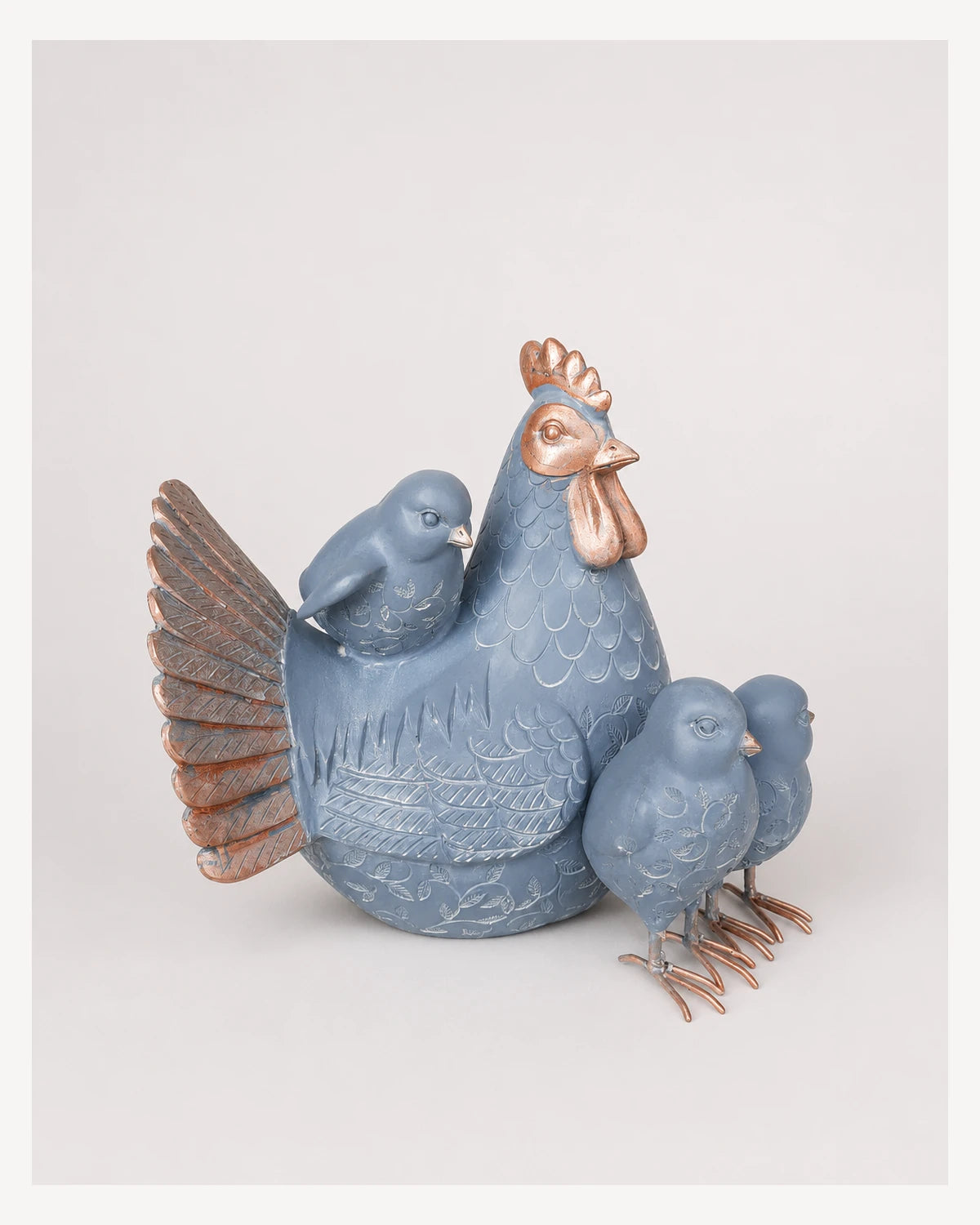 Gallina azul con pollitos