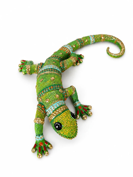 Lagarto decorativo verde y dorado