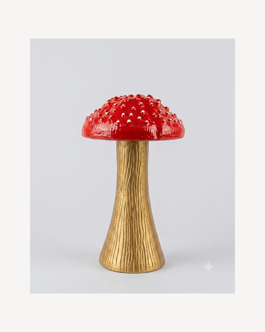 Hongo rojo y dorado decorativo