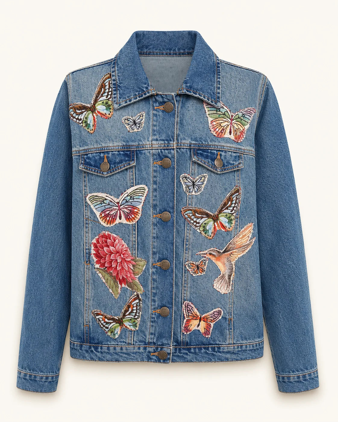Chaqueta denim azul con mariposas y ave