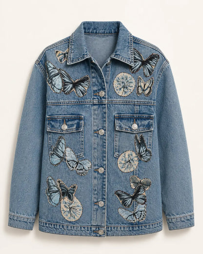 Chaqueta de denim azul con mariposas bordadas