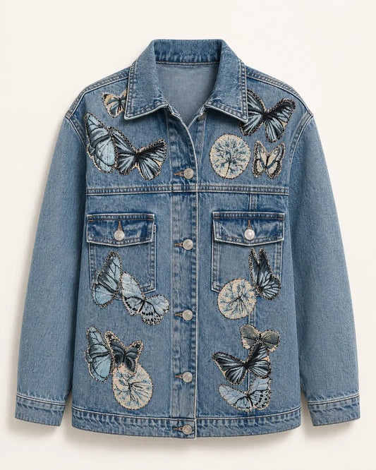Chaqueta de denim azul con mariposas bordadas