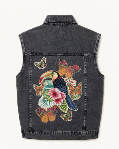 Chaleco de denim negro con aplicaciones tropicales