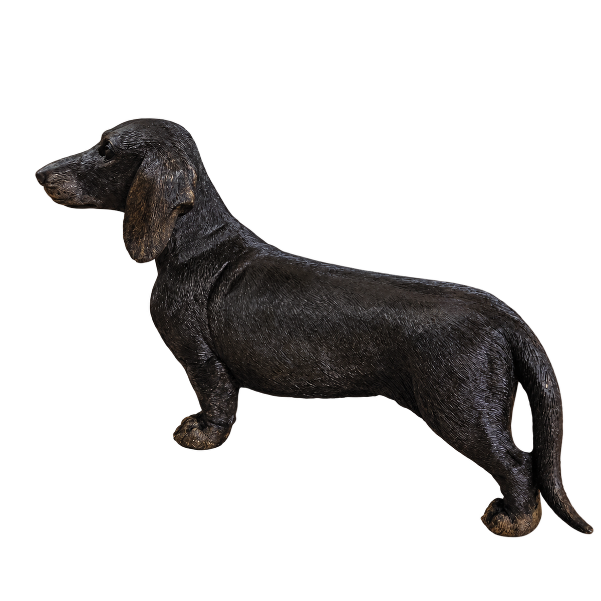 Figura de perro salchicha en marmolina de tono oscuro, vista lateral completa